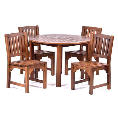 Round dining table with four side chairs