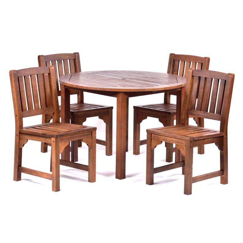 Round dining table with four side chairs
