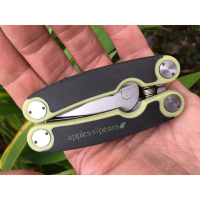Apple Green Folding Pocket Secateurs in Hand