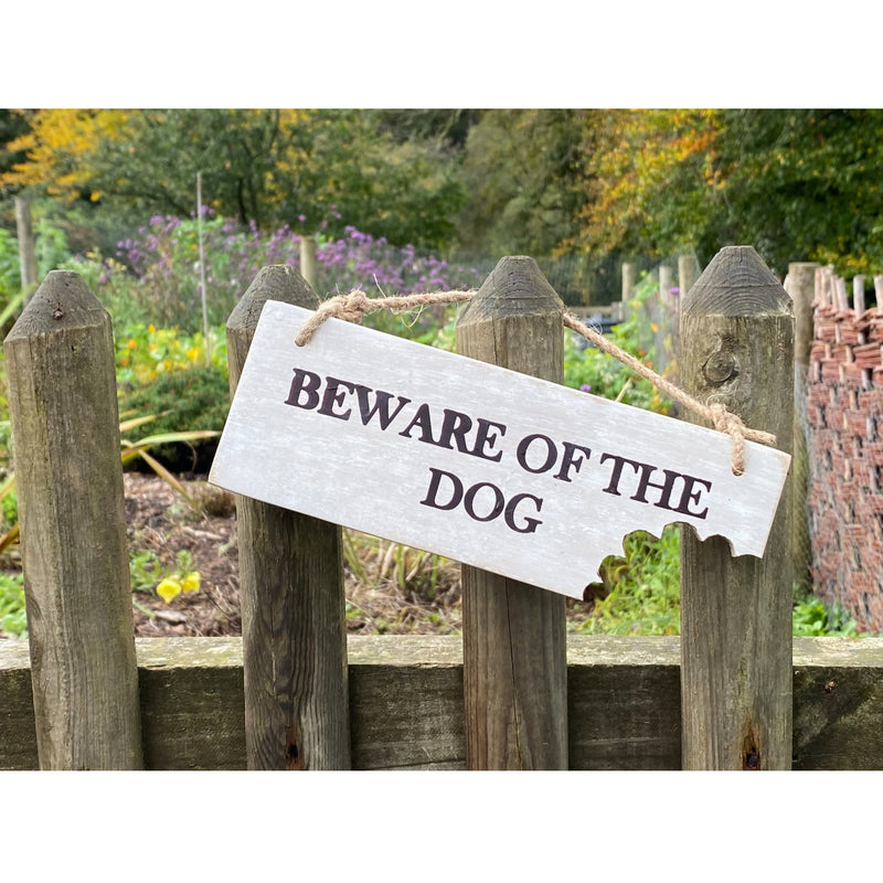 Beware of the Dog Sign with a Bite Taken Out